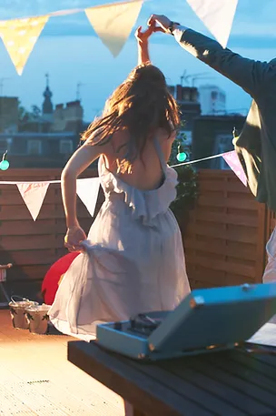 Dancing on a rooftop terrace