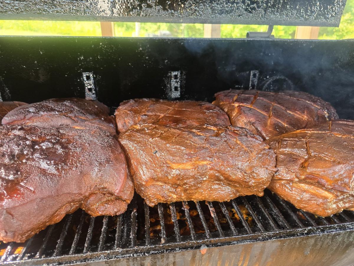 Smoked meat on grill rack