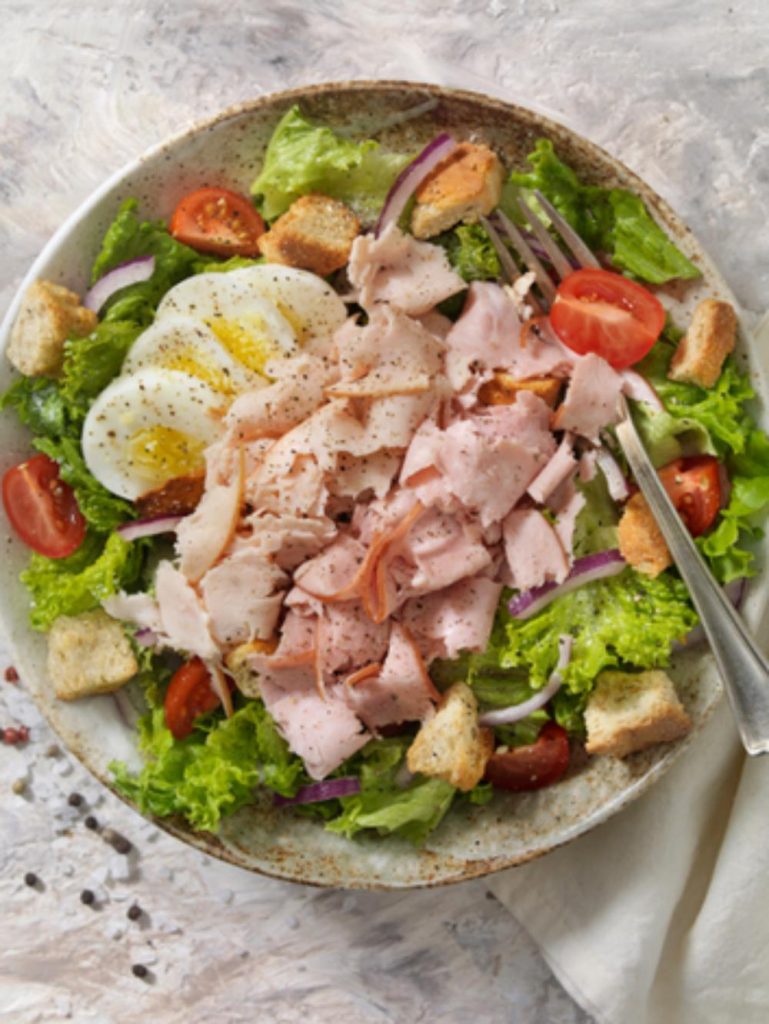 Turkey salad with egg and tomatoes